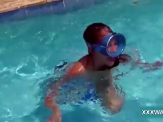 Super brunette whore Candy swims underwater